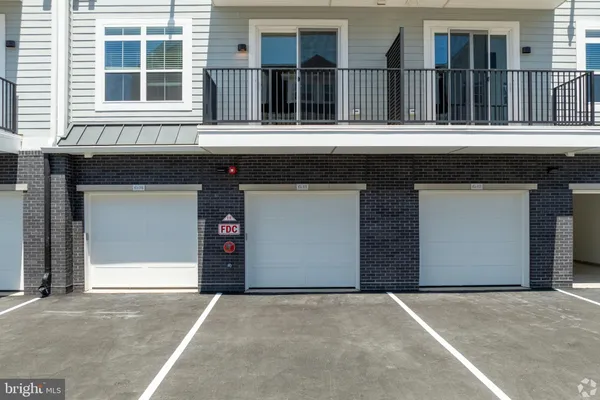 a front view of a building with street view