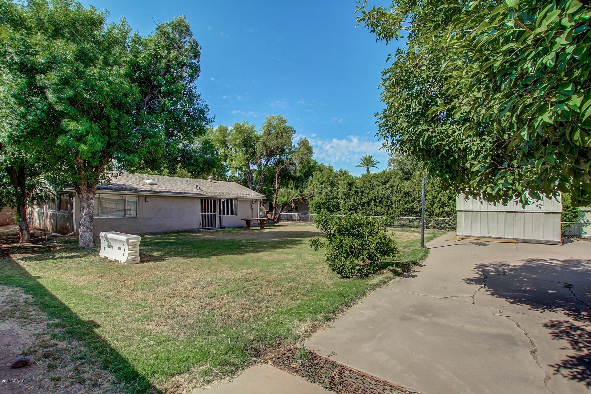 330 East 14th Street Tempe, AZ 85281 - Photo 21 of 26 a view of backyard of house with green space