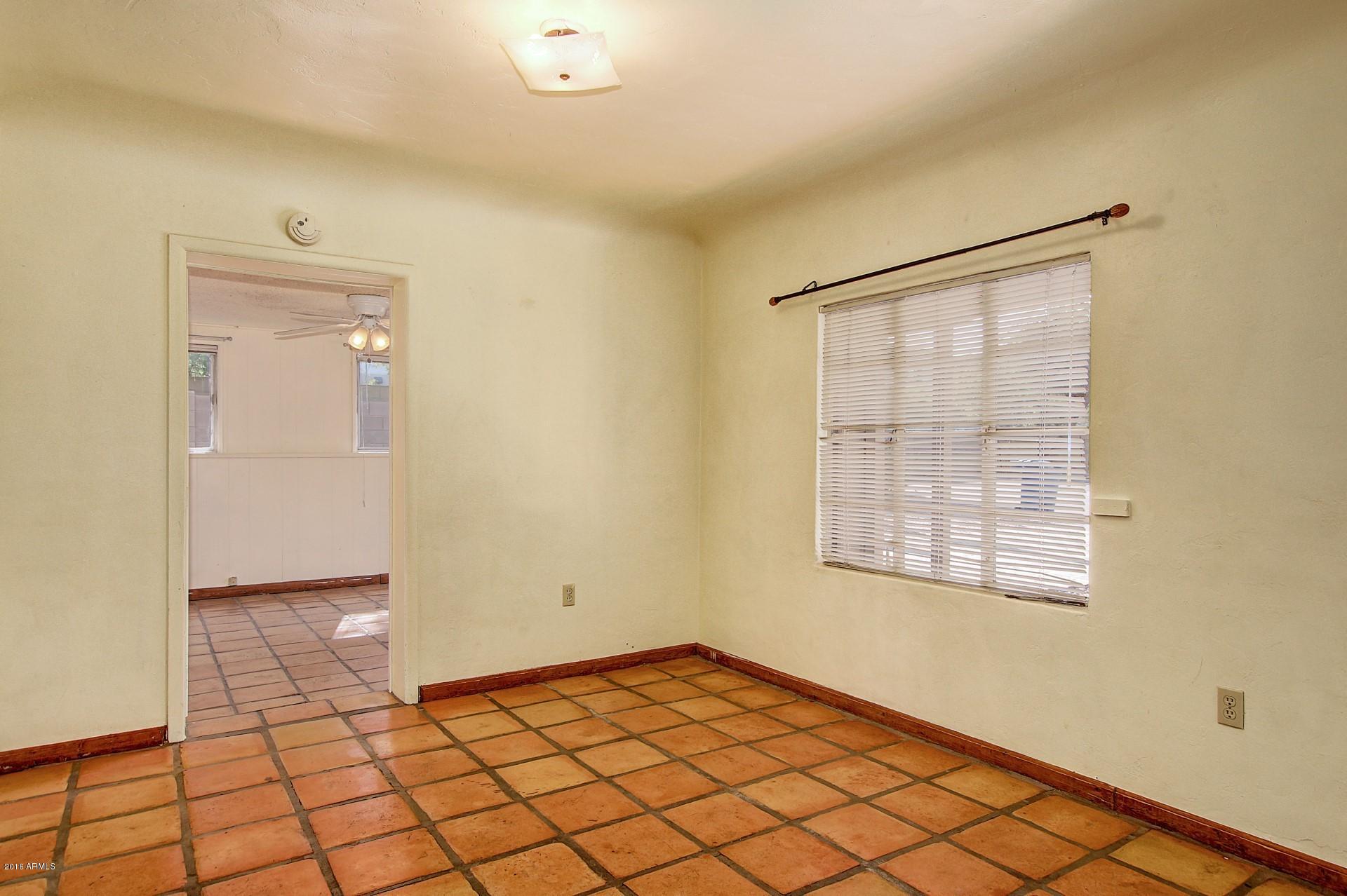 330 East 14th Street Tempe, AZ 85281 - Photo 4 of 26 a view of an empty room and window