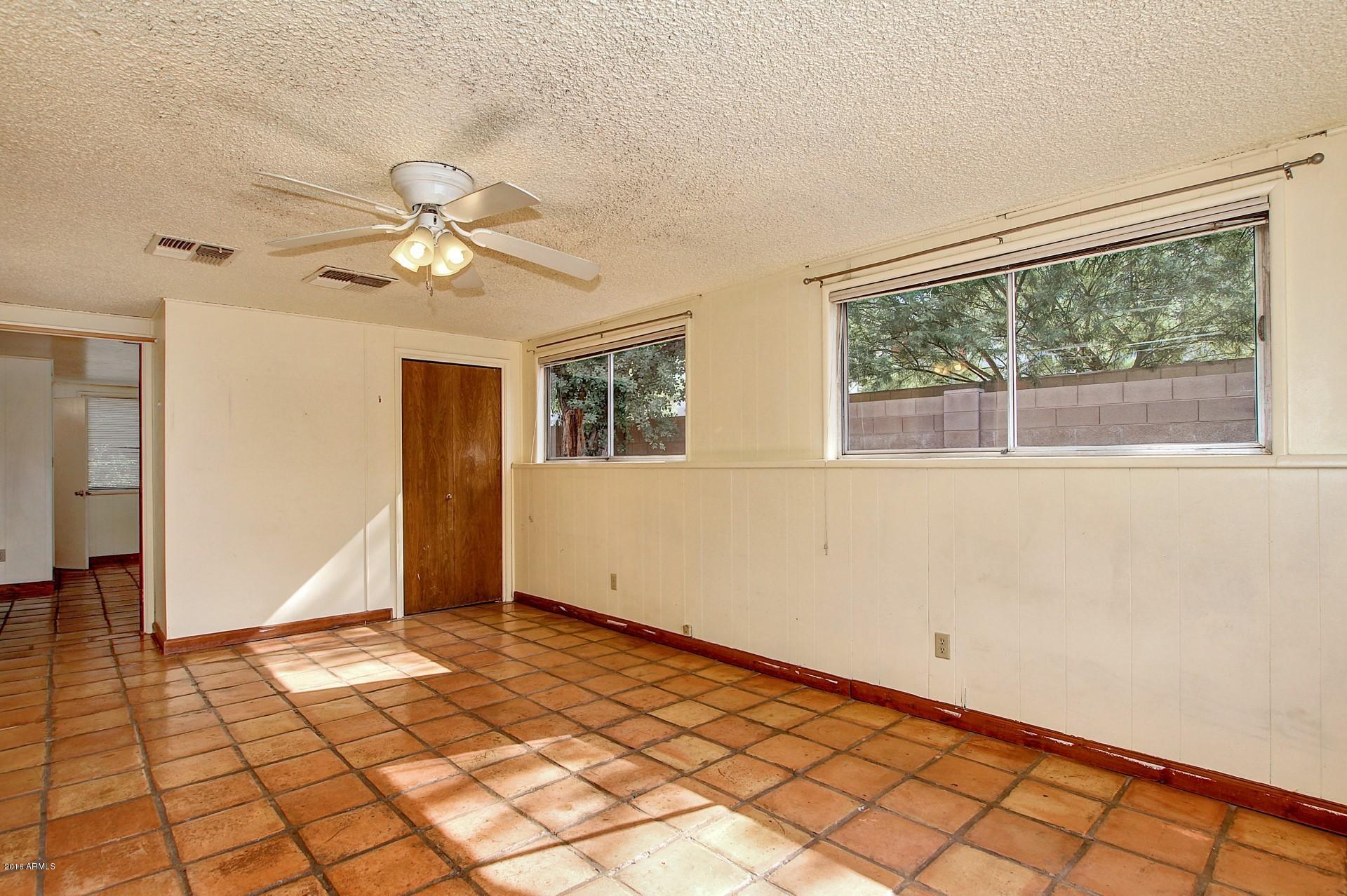 330 East 14th Street Tempe, AZ 85281 - Photo 9 of 26 a view of an empty room with a window