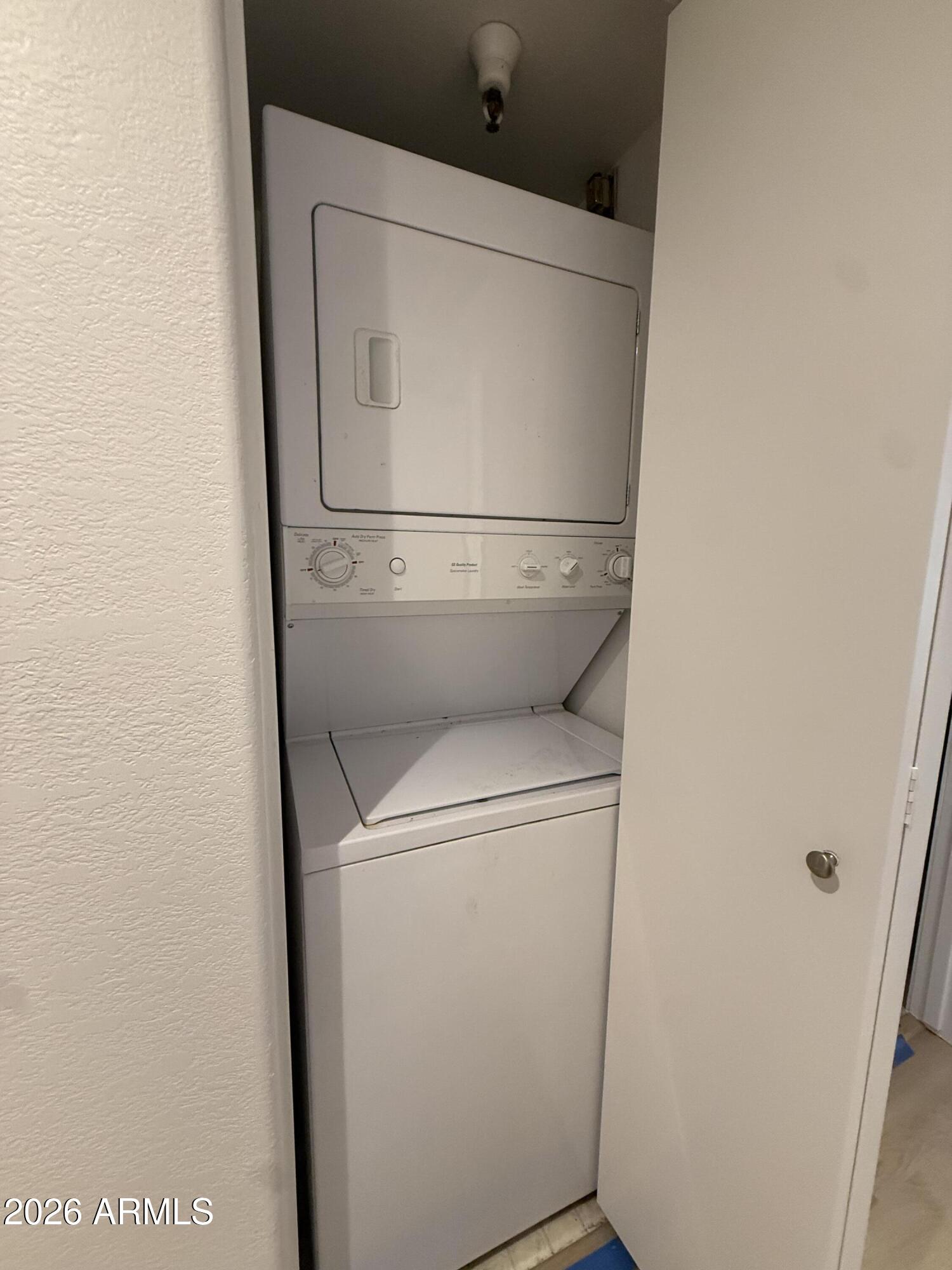 255 South Kyrene Road, Unit 140 Chandler, AZ 85226 - Photo 8 of 13 a utility room with dryer and washer