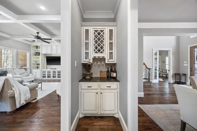 a living room with fireplace furniture and a flat screen tv