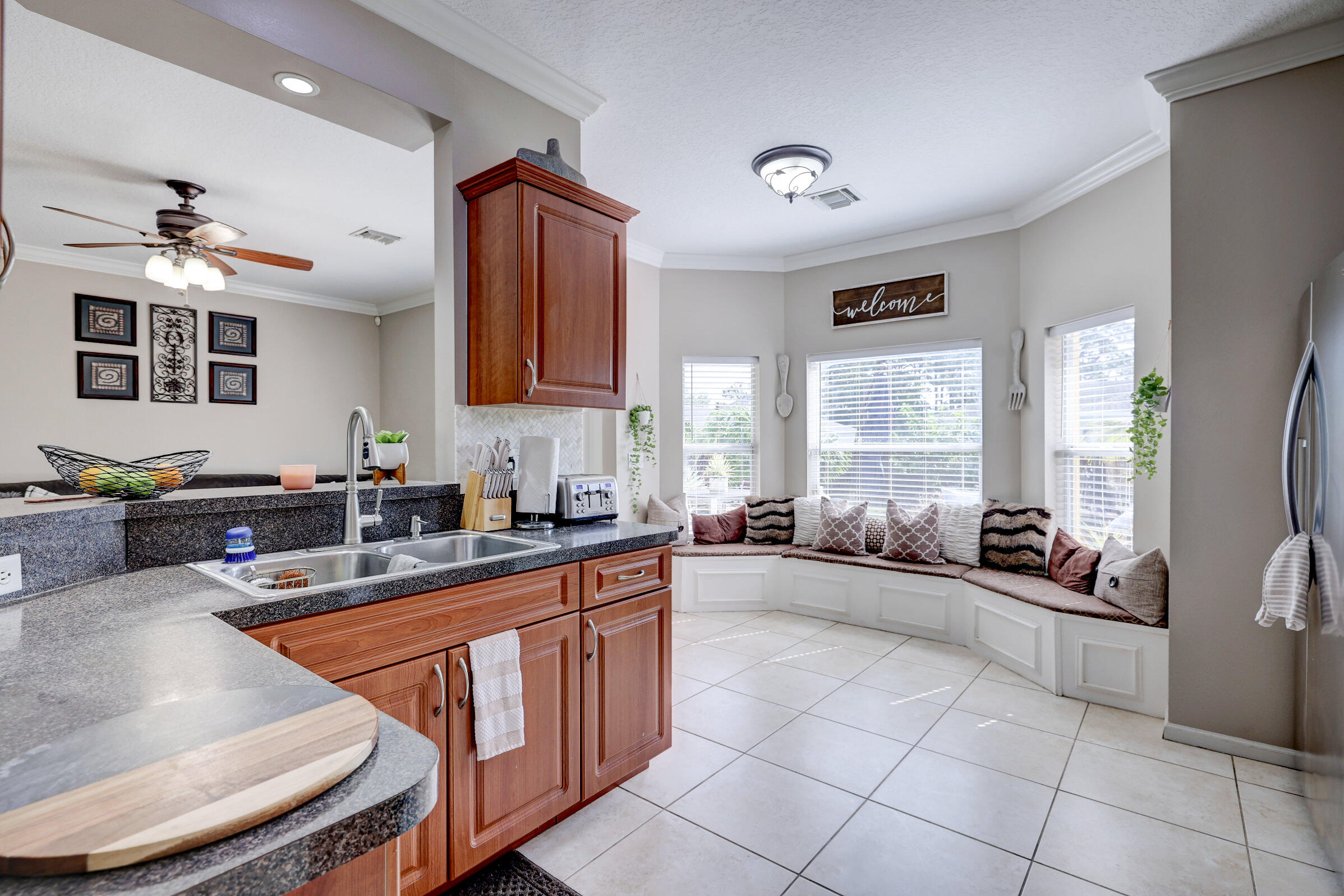 2481 Southwest Roney Road Port St. Lucie, FL 34953 - Photo 12 of 38 kitchen into sitting