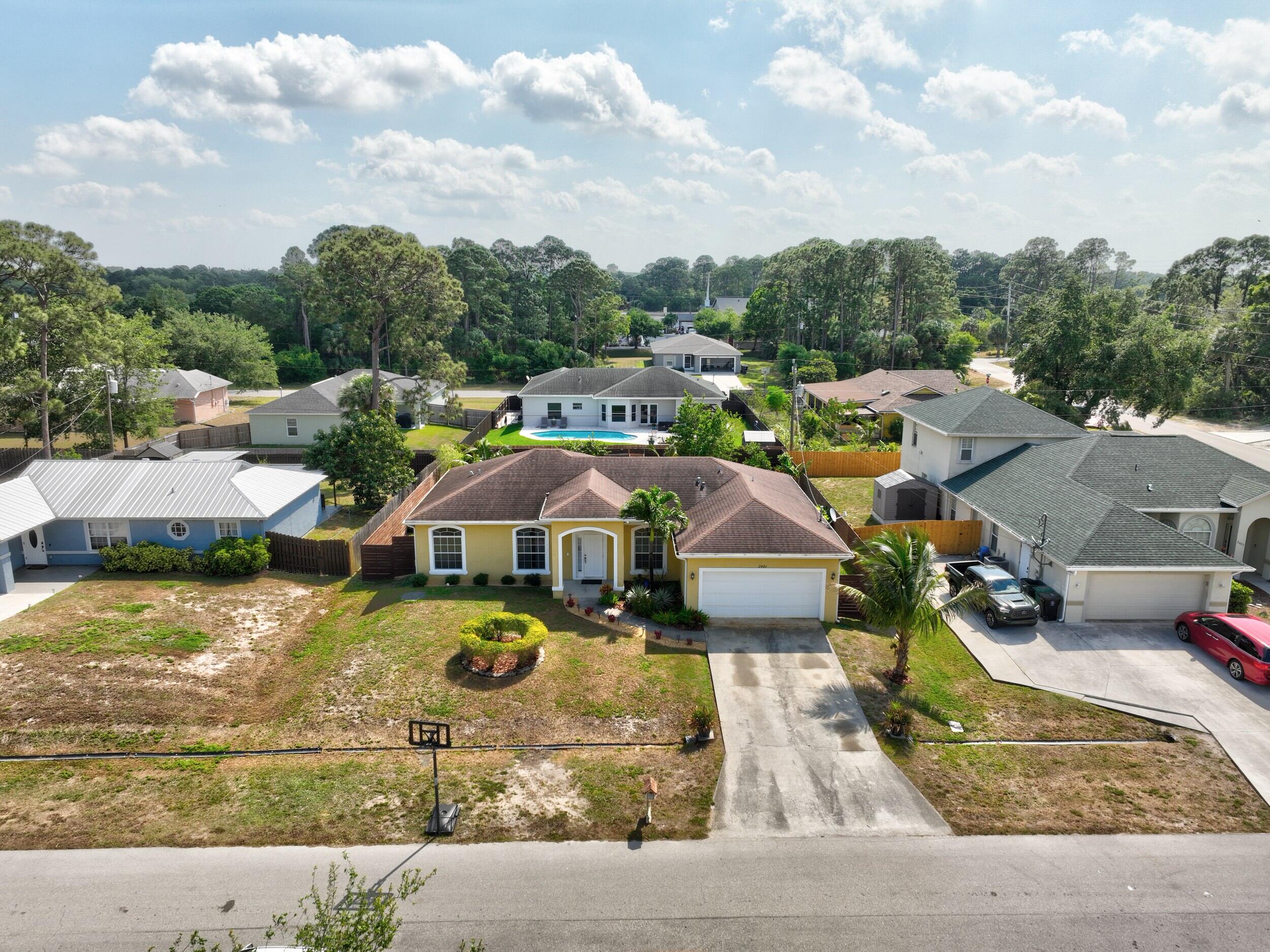 2481 Southwest Roney Road Port St. Lucie, FL 34953 - Photo 32 of 38 drone 2
