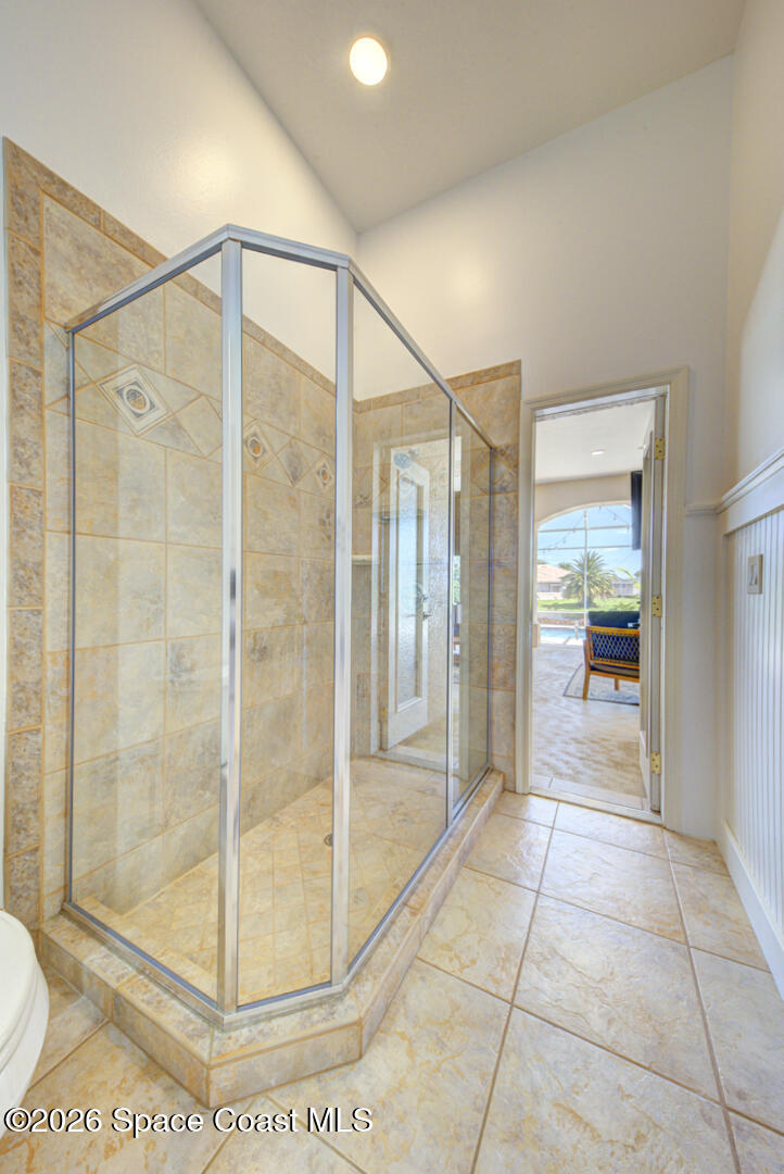 4070 Stoney Point Road Melbourne, FL 32940 - Photo 37 of 78 bathroom 3 with cabana door