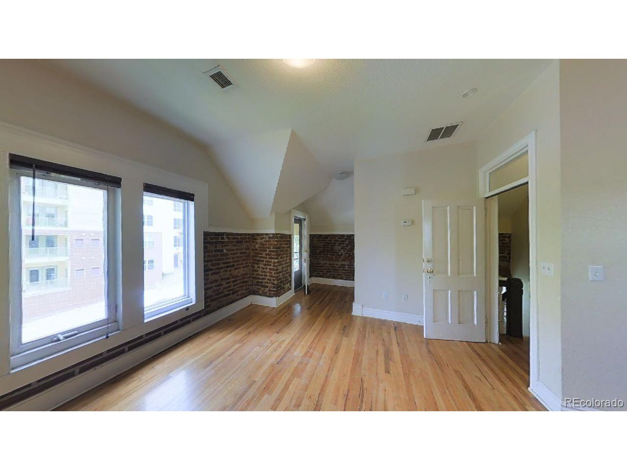 2743 Bryant Street Denver, CO 80211 - Photo 11 of 24 a upper view of a living room and bathroom with a large window