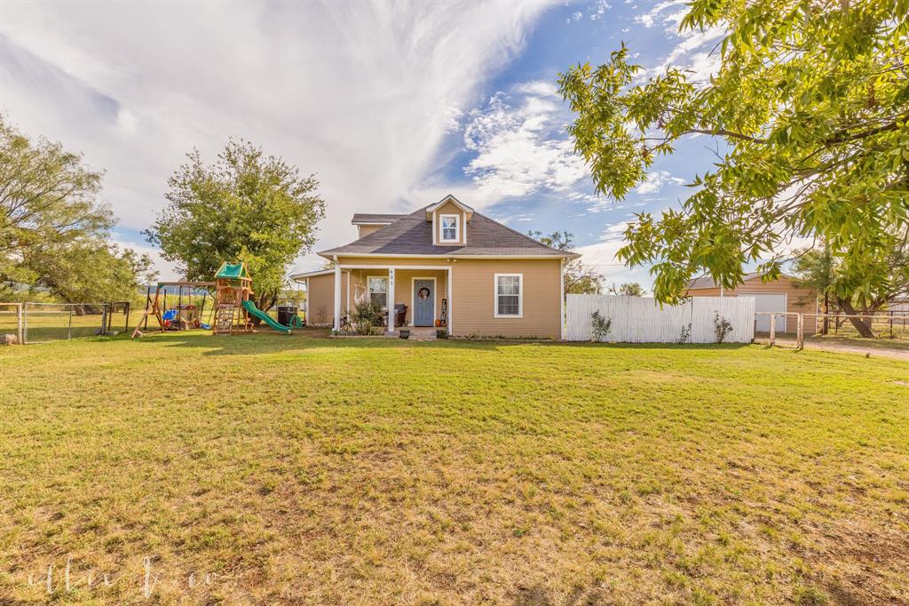 a front view of a building with swimming pool