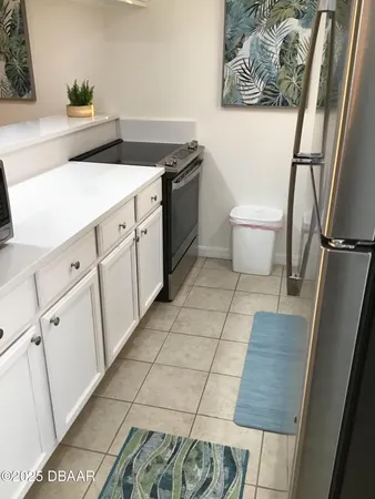 a bedroom with a bed and a mirror