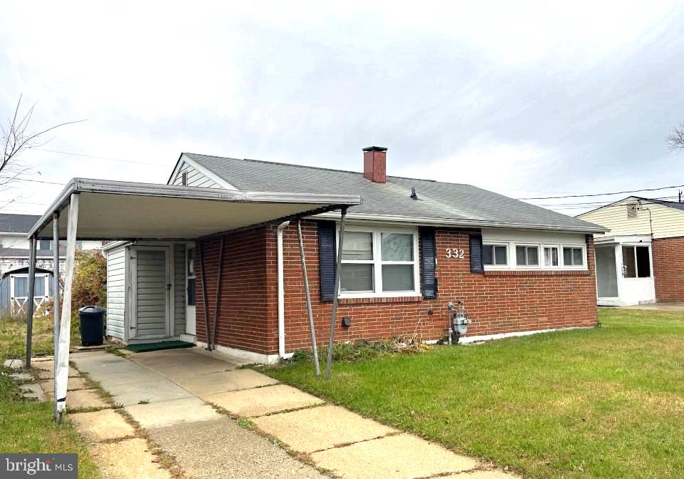 332 Suter Road Baltimore, MD 21228 - Photo 2 of 3 a front view of a house with a garden