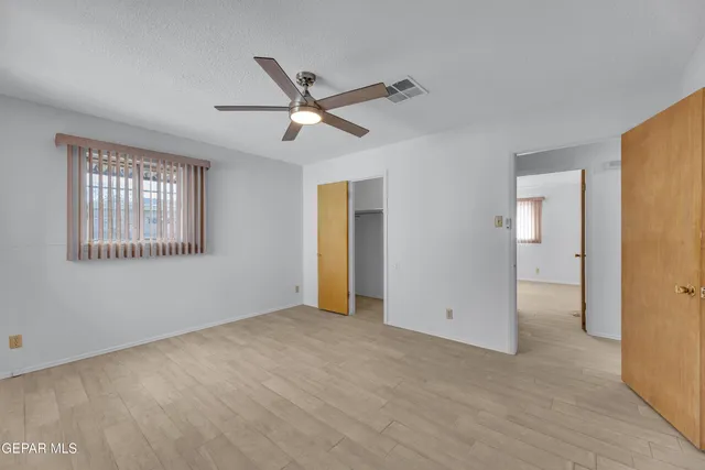a bathroom with a sink a vanity and a mirror