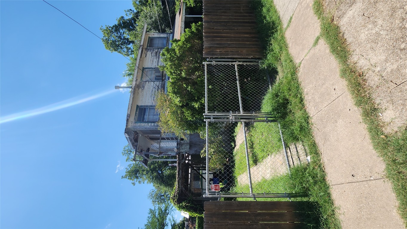 85 Navasota Street Austin, TX 78702 - Photo 13 of 17 View of front of property featuring a gate