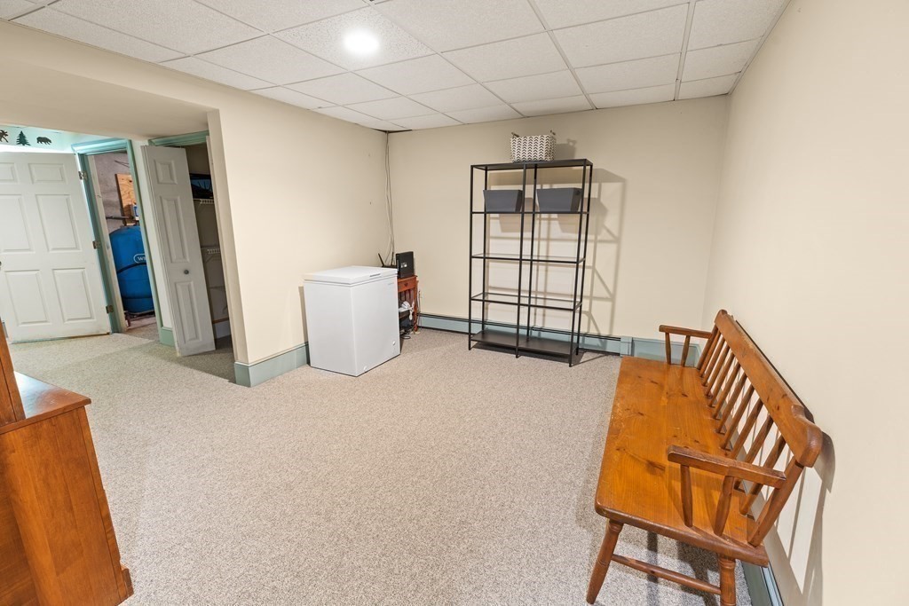 1983 Bay Road Sharon, MA 02067 - Photo 23 of 26 a living room with furniture and a window