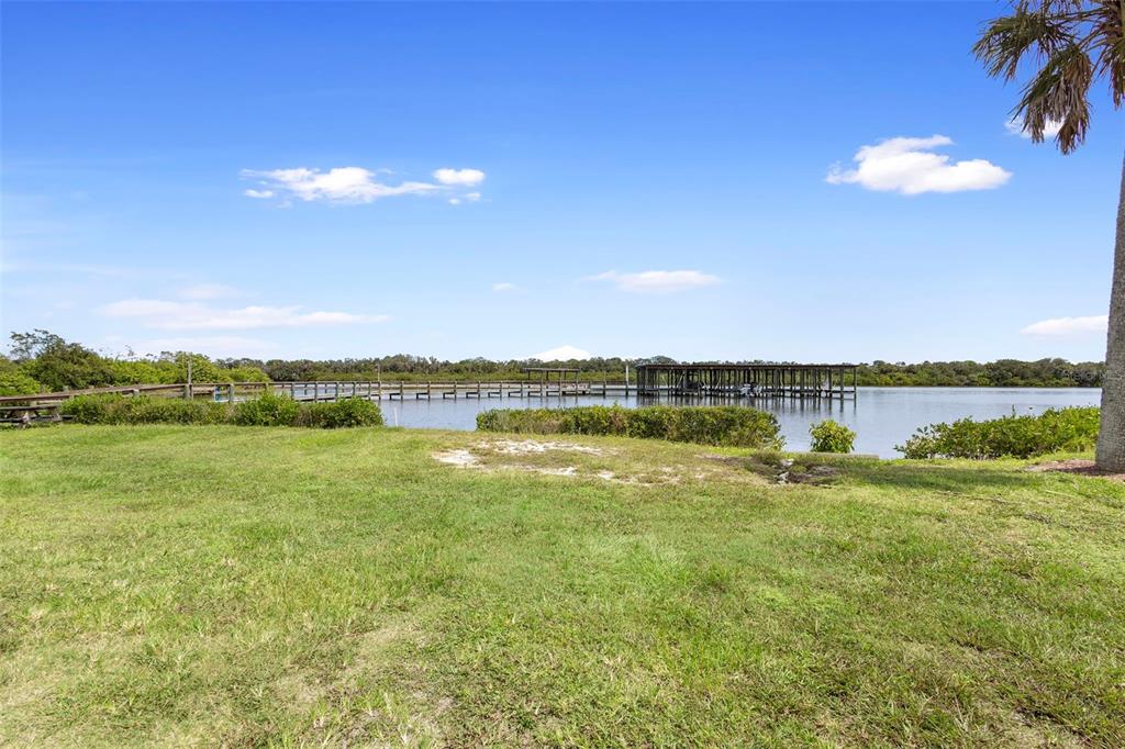 4393 Maple Avenue Edgewater, FL 32141 - Photo 31 of 41 a view of an ocean and beach