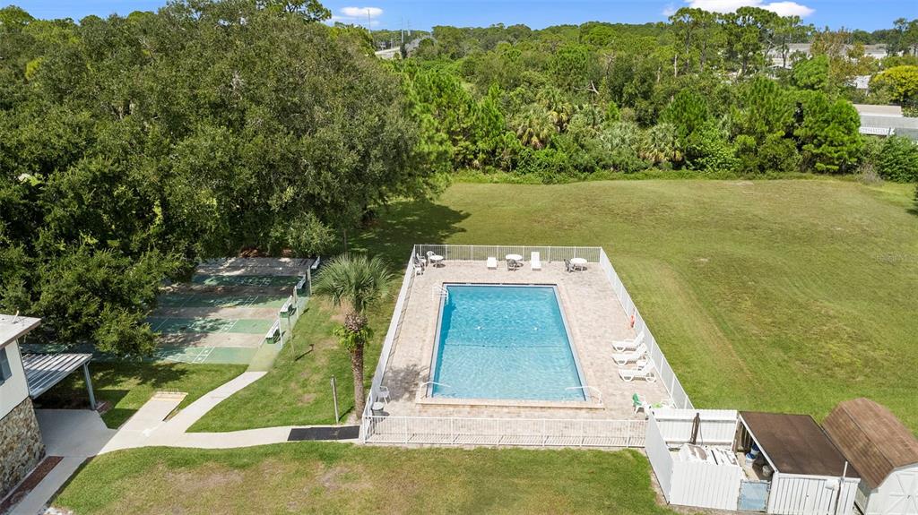 4393 Maple Avenue Edgewater, FL 32141 - Photo 32 of 41 a view of a yard in front of the house