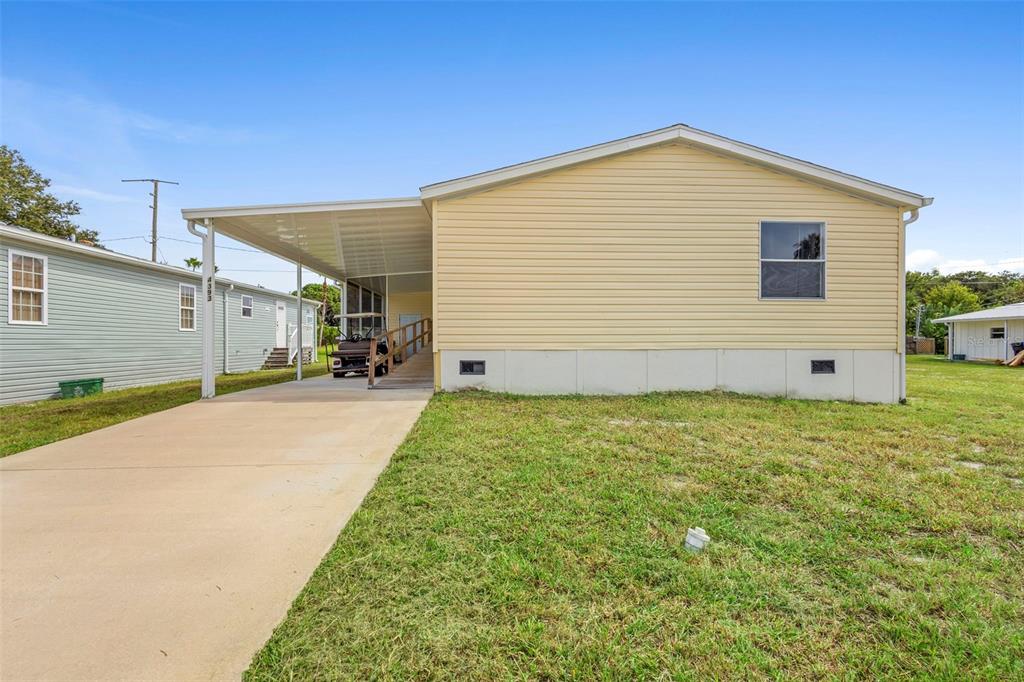4393 Maple Avenue Edgewater, FL 32141 - Photo 38 of 41 a view of a backyard of the house