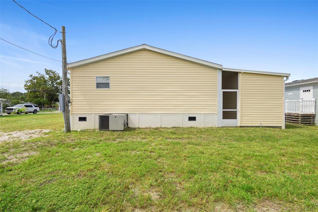 4393 Maple Avenue Edgewater, FL 32141 - Photo 41 of 41 a view of a backyard of the house
