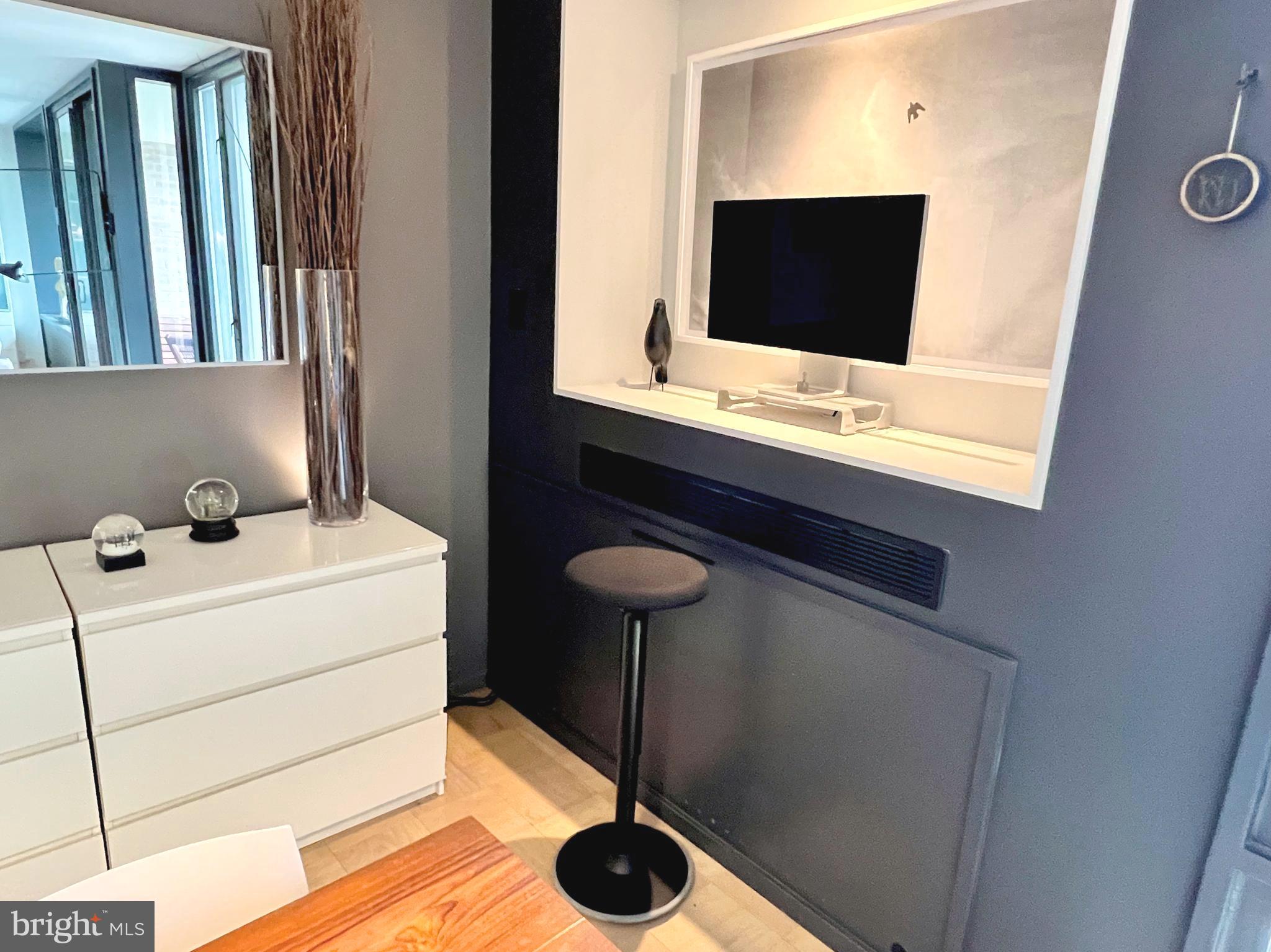 429 N Street Southwest, Unit S510 Washington, DC 20024 - Photo 12 of 45 a bathroom with a sink and a mirror