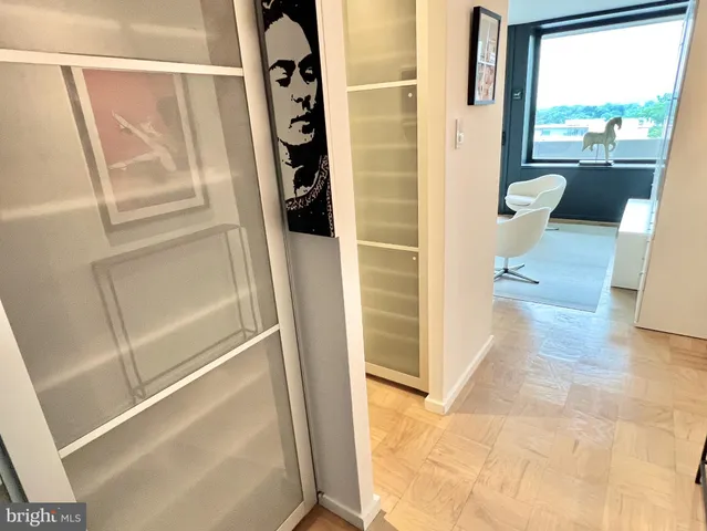 a bathroom with a shower and a mirror