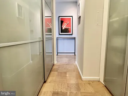 a view of a small space with wooden floor