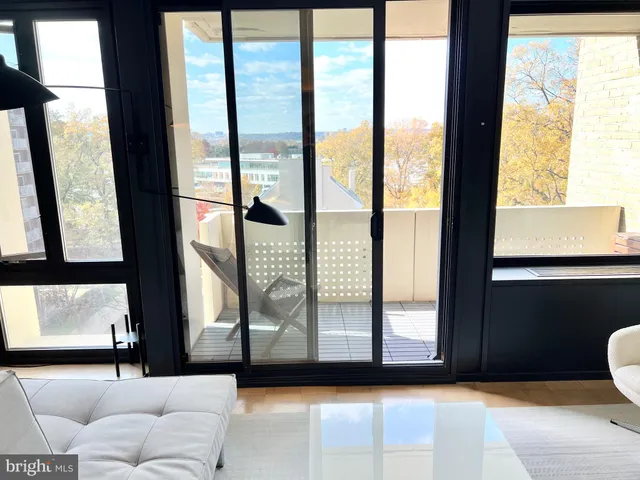 a view of a balcony with city view