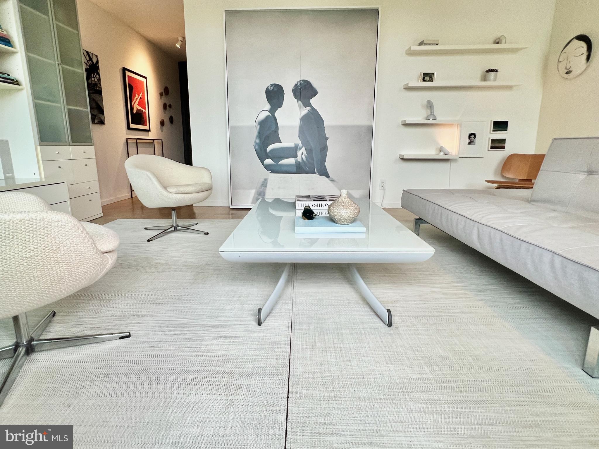 429 N Street Southwest, Unit S510 Washington, DC 20024 - Photo 5 of 45 a living room with furniture and a wooden floor