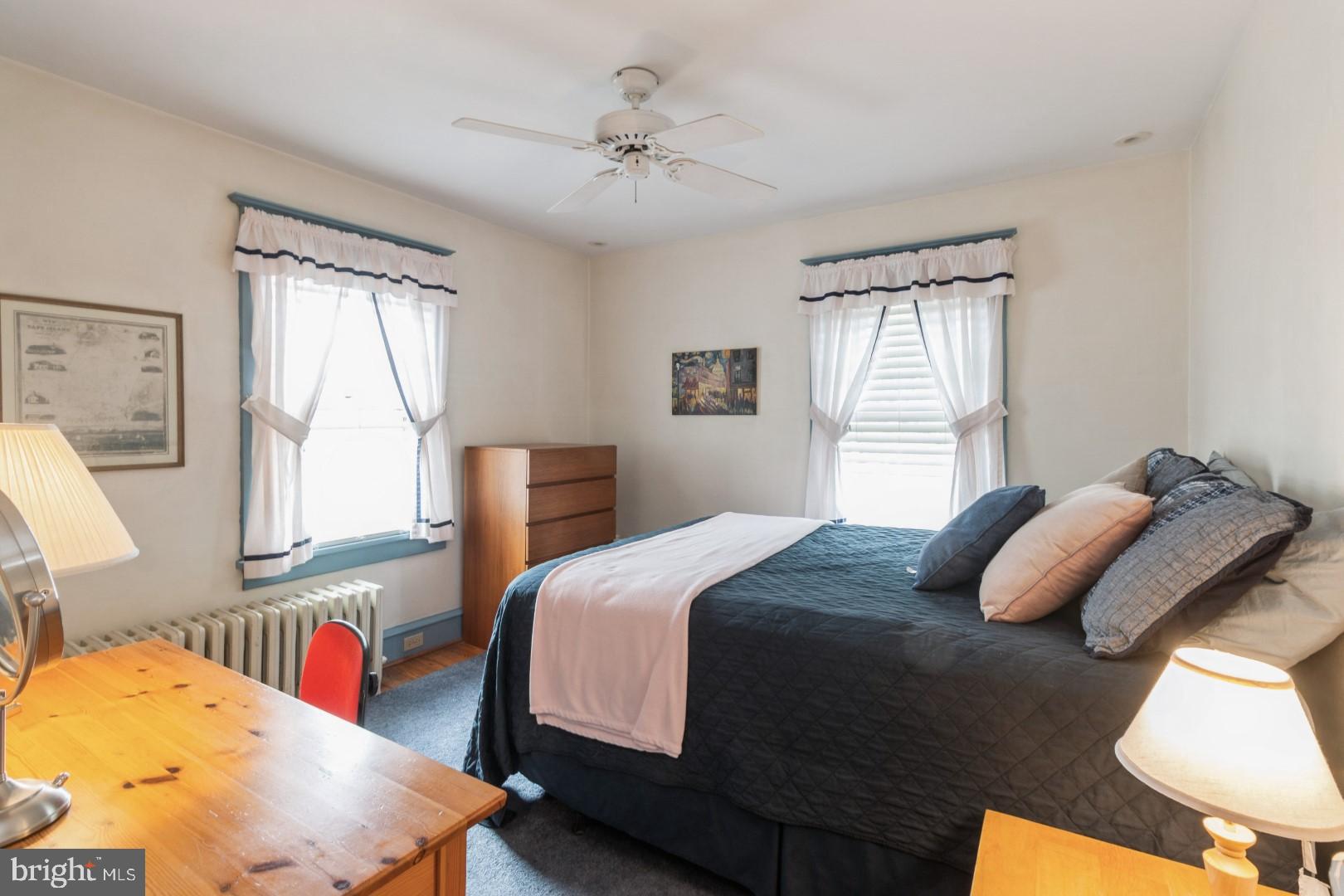 400 Maple Avenue Haddonfield, NJ 08033 - Photo 14 of 31 a bedroom with bed and a window