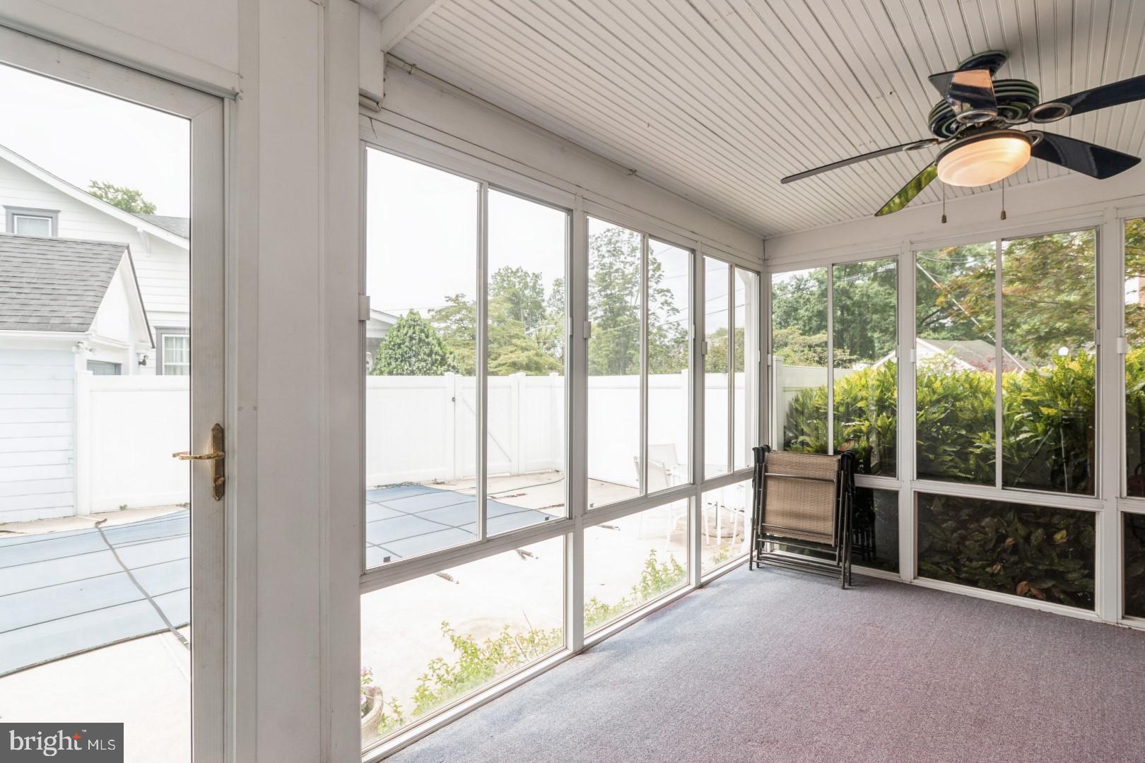 400 Maple Avenue Haddonfield, NJ 08033 - Photo 19 of 31 a view of a porch with a floor to ceiling window