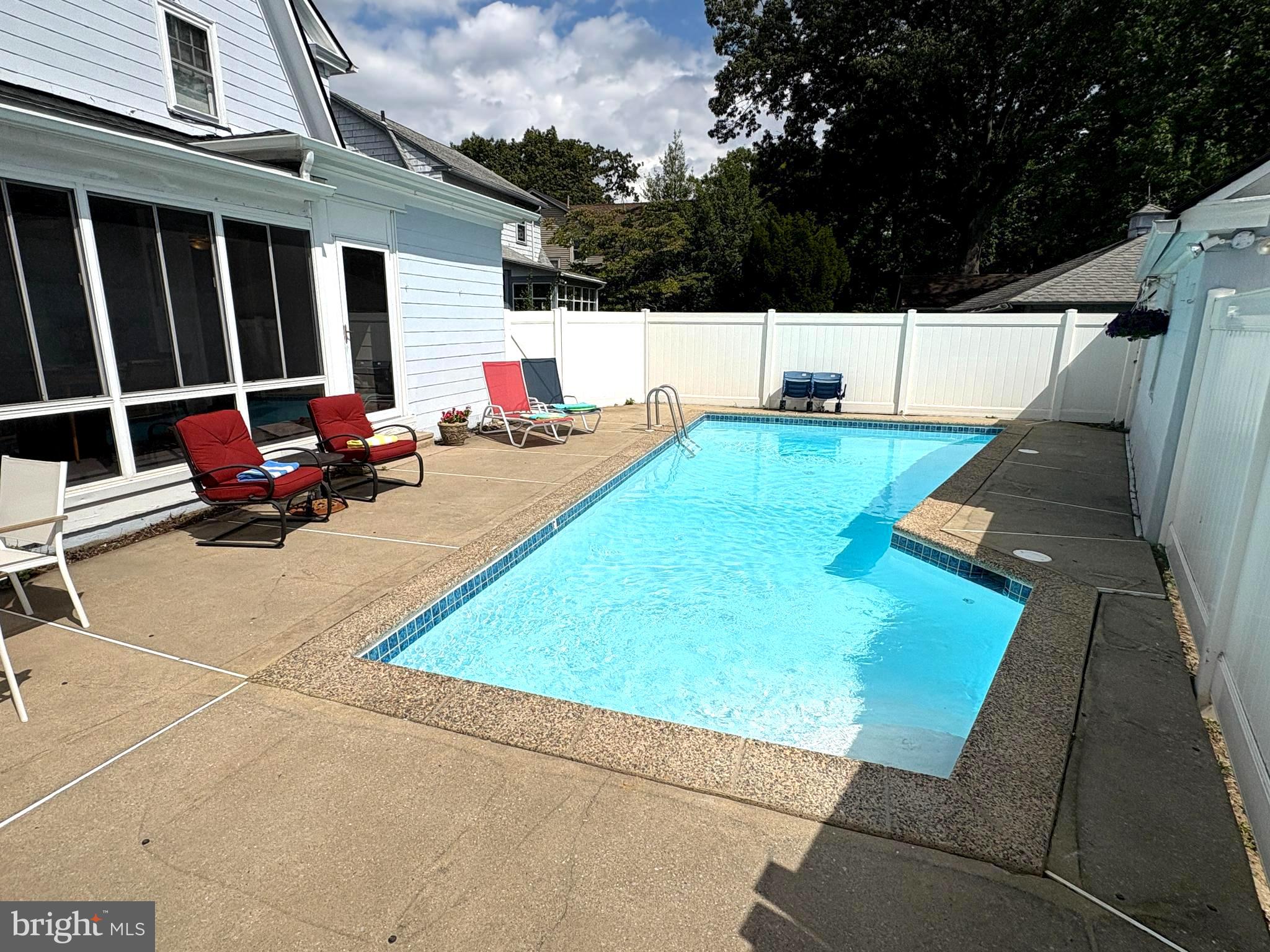 400 Maple Avenue Haddonfield, NJ 08033 - Photo 22 of 31 a view of a backyard with sitting area and furniture