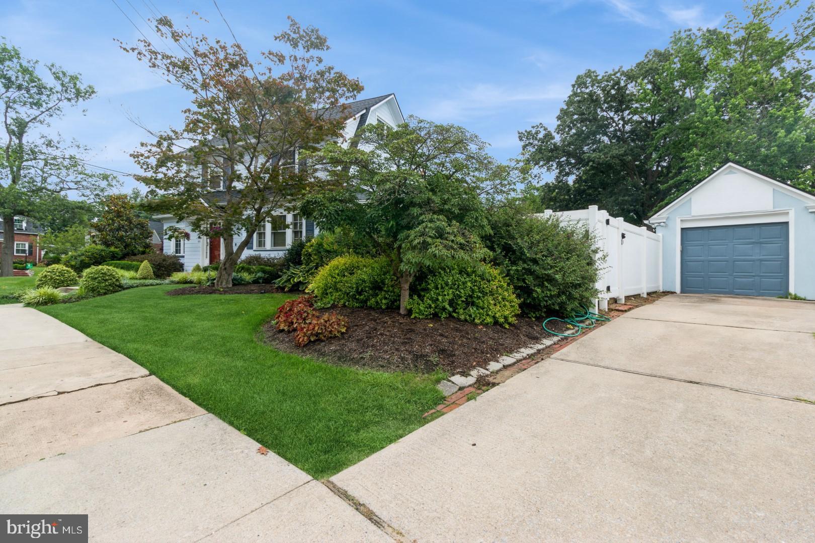 400 Maple Avenue Haddonfield, NJ 08033 - Photo 31 of 31 a front view of a house with a yard