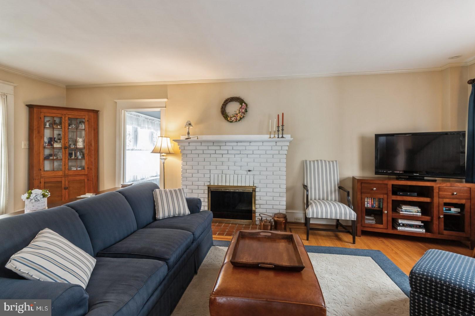400 Maple Avenue Haddonfield, NJ 08033 - Photo 4 of 31 a living room with furniture and a flat screen tv