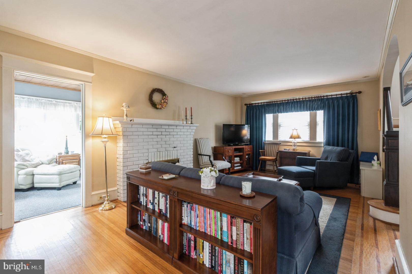 400 Maple Avenue Haddonfield, NJ 08033 - Photo 5 of 31 a living room with furniture wooden floor and a flat screen tv