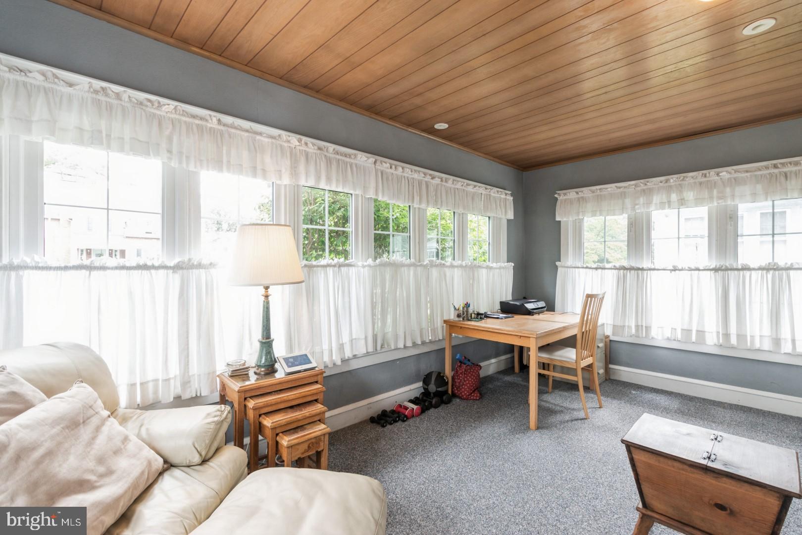 400 Maple Avenue Haddonfield, NJ 08033 - Photo 7 of 31 a living room with furniture and a table