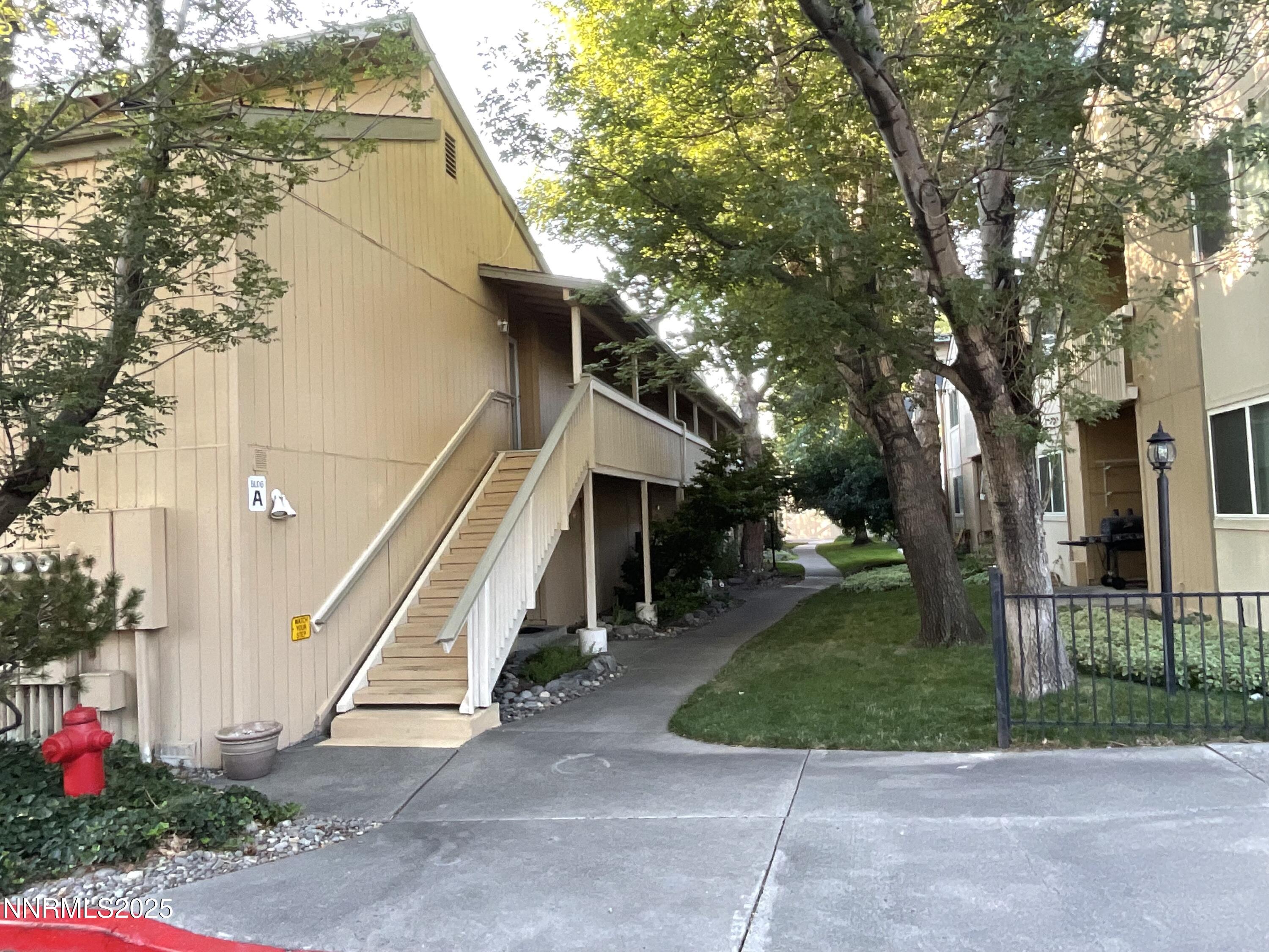2300 Dickerson Road, Unit 8 Reno, NV 89503 - Photo 1 of 18 a view of a house with a yard