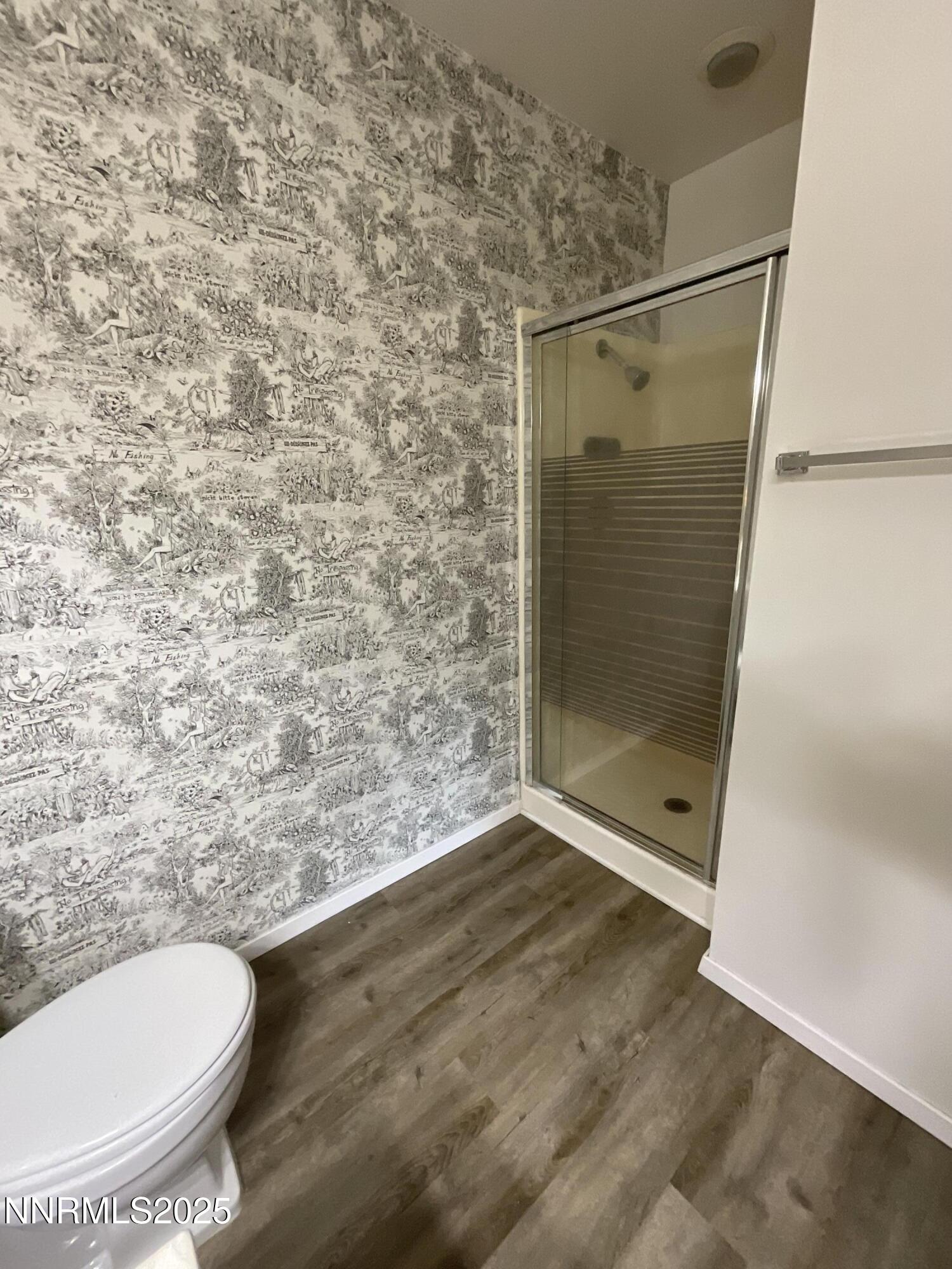 2300 Dickerson Road, Unit 8 Reno, NV 89503 - Photo 12 of 18 a bathroom with a granite countertop shower and a toilet