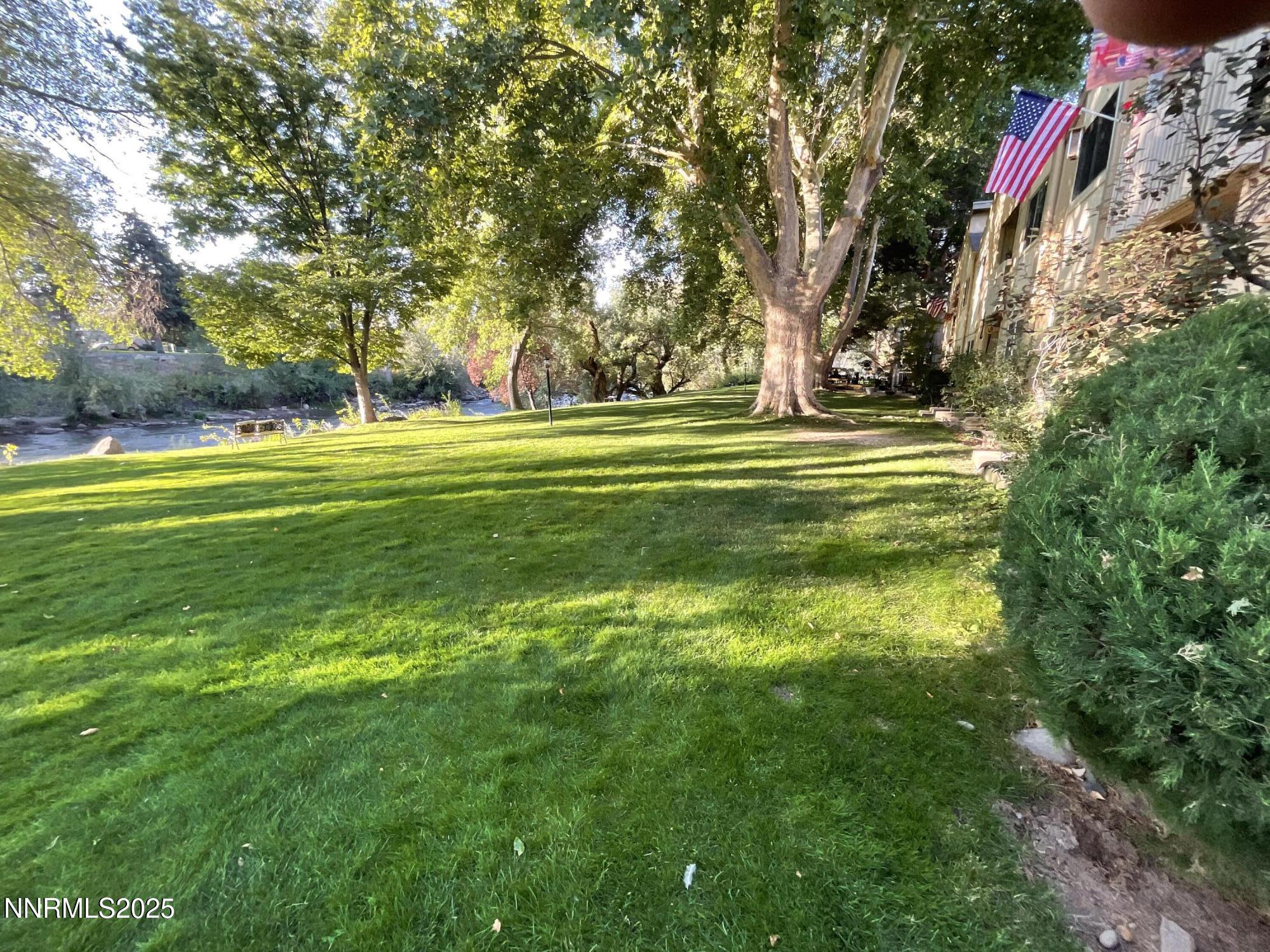 2300 Dickerson Road, Unit 8 Reno, NV 89503 - Photo 16 of 18 a garden view with swimming pool