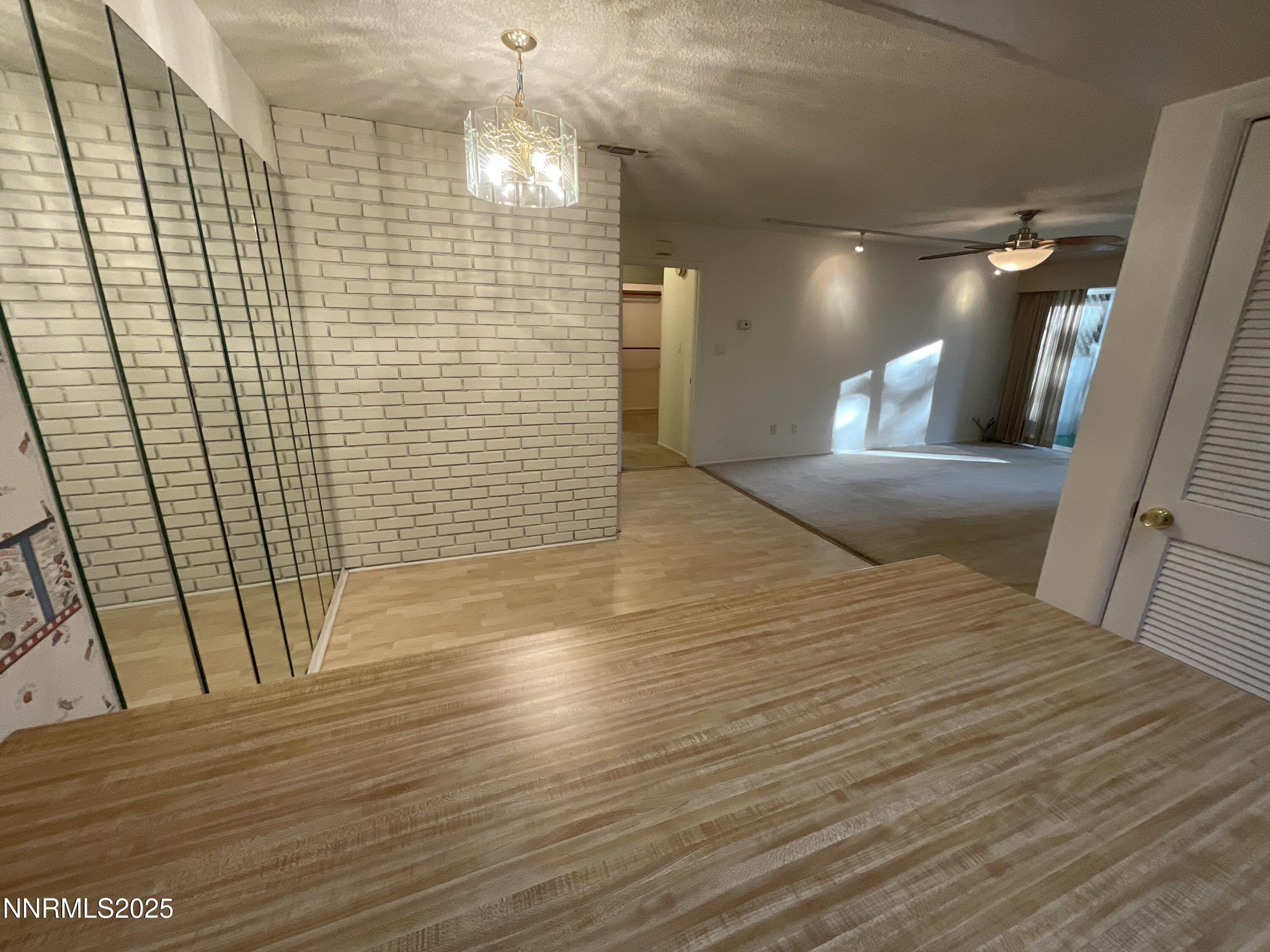 2300 Dickerson Road, Unit 8 Reno, NV 89503 - Photo 5 of 18 a view of empty room with wooden floor