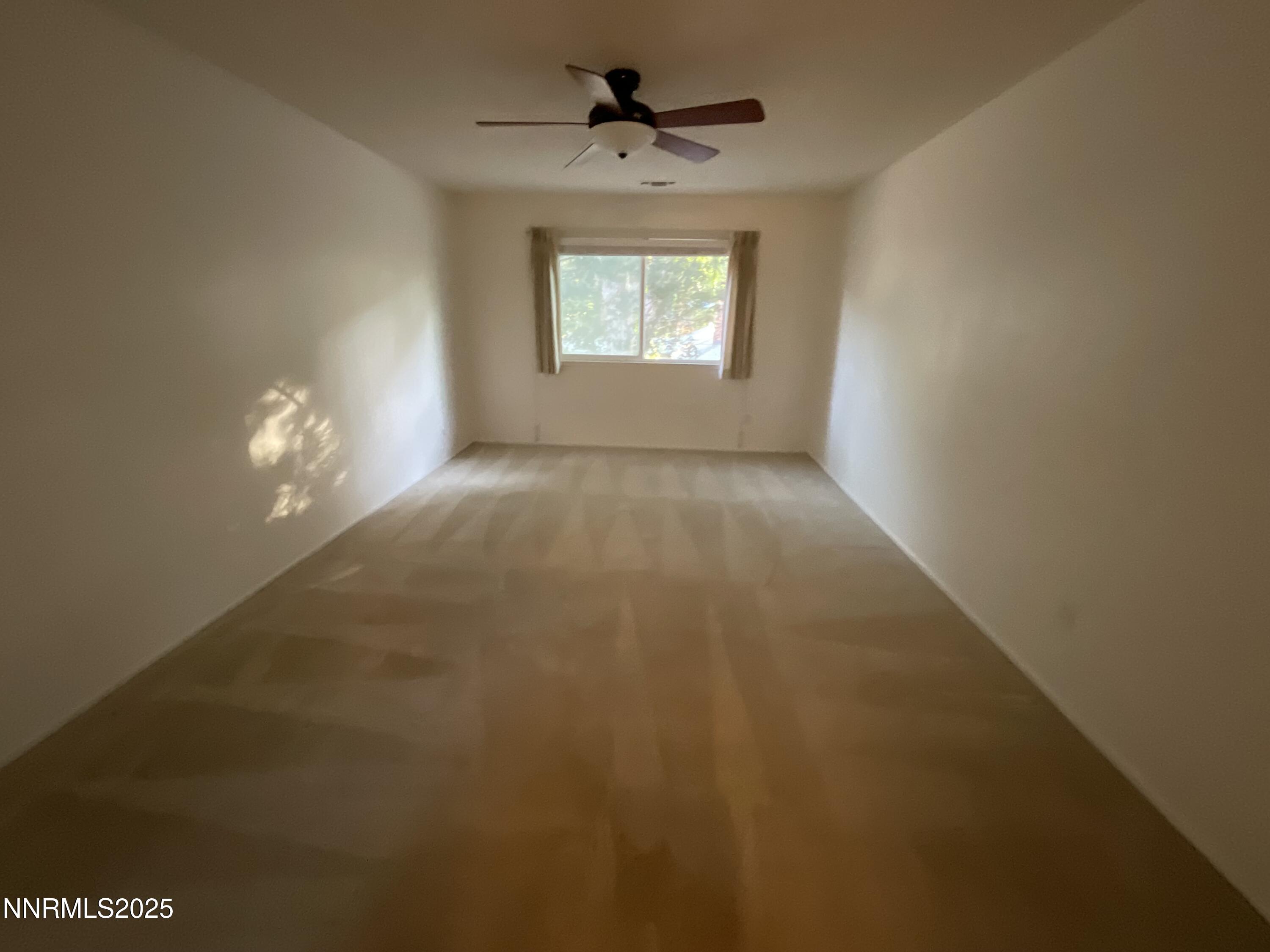 2300 Dickerson Road, Unit 8 Reno, NV 89503 - Photo 6 of 18 a view of an empty room and window