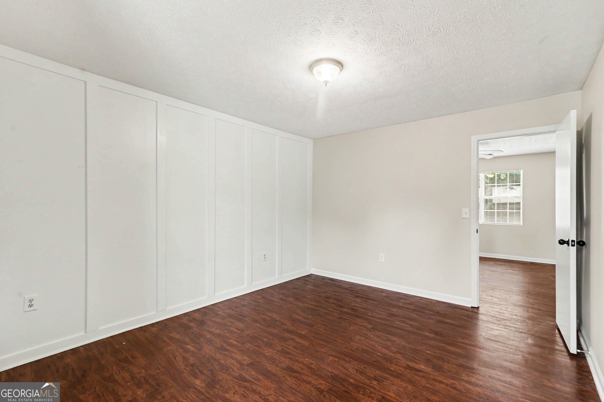 209 East Wilson Street Villa Rica, GA 30180 - Photo 17 of 24 SECOND BEDROOM WITH ACCENT WALL.