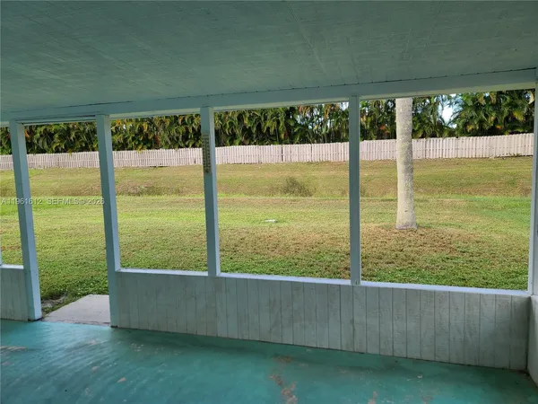 a view of a large window with an outdoor space