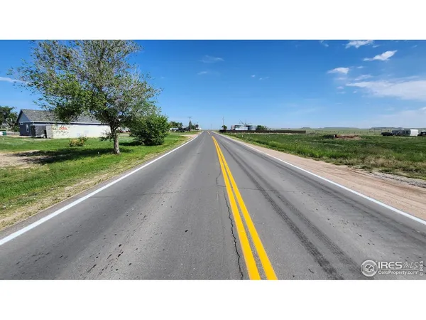 a view of swimming pool with a yard