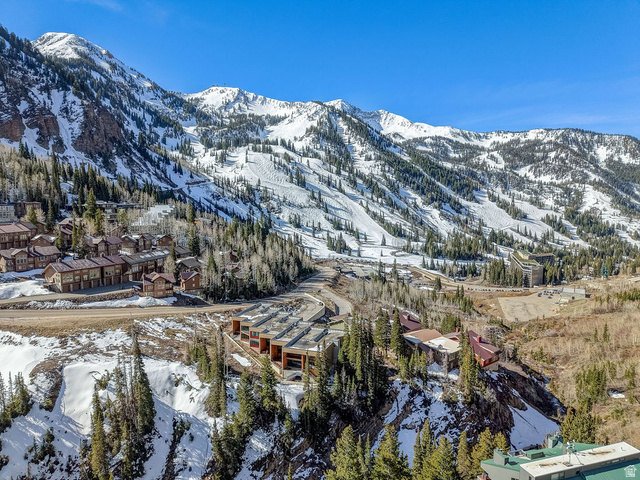 9699 Bypass Road, Unit 5 Alta, UT 84092 - Photo 47 of 54 Mountain property featuring a collection of structures, snow-covered slopes, and evergreen trees