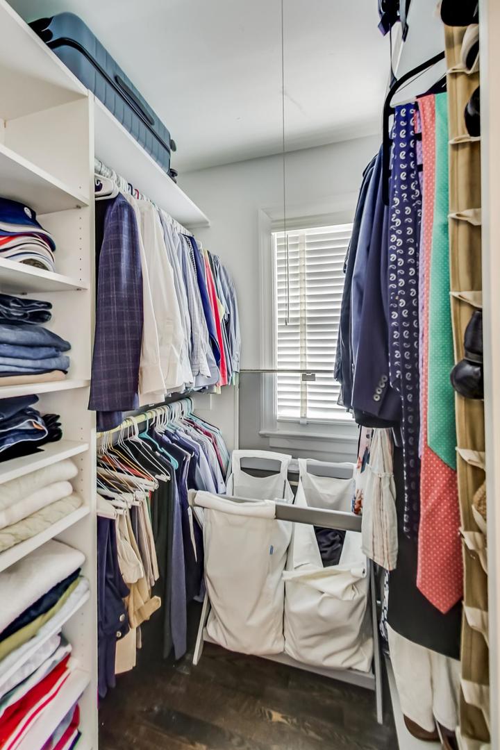 206 Green Bay Road Winnetka, IL 60093 - Photo 22 of 45 a view of walk in closet with clothes and shoes
