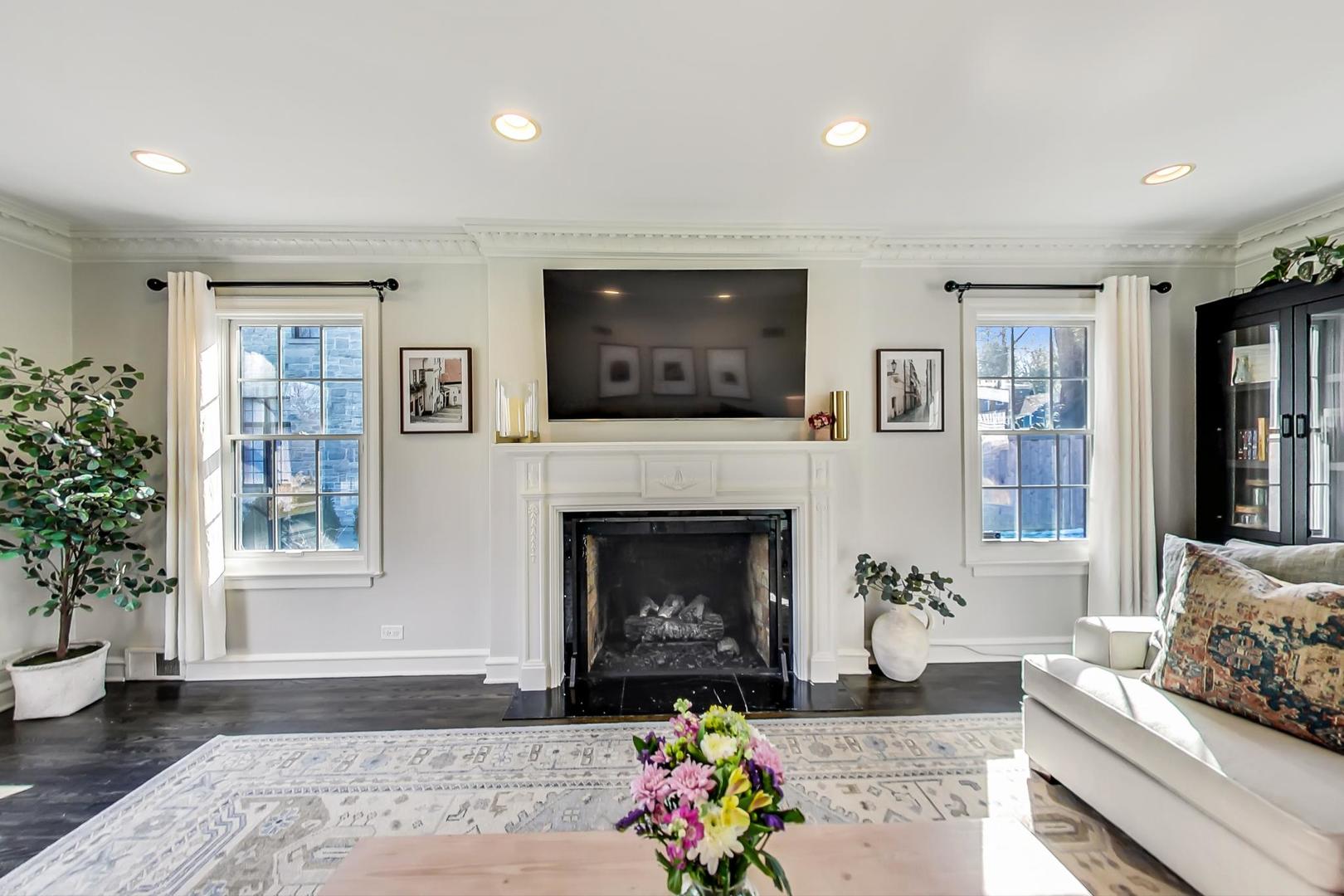 206 Green Bay Road Winnetka, IL 60093 - Photo 5 of 45 a living room with furniture and a fireplace