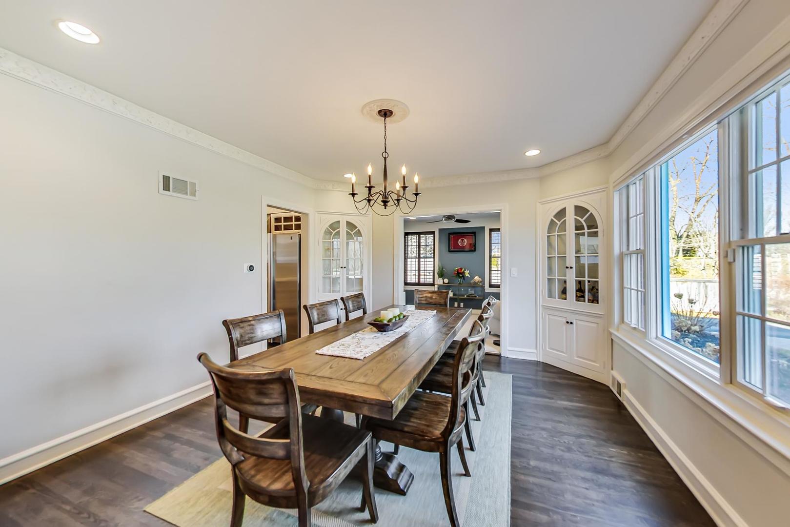 206 Green Bay Road Winnetka, IL 60093 - Photo 8 of 45 a view of a dining room with furniture window and wooden floor