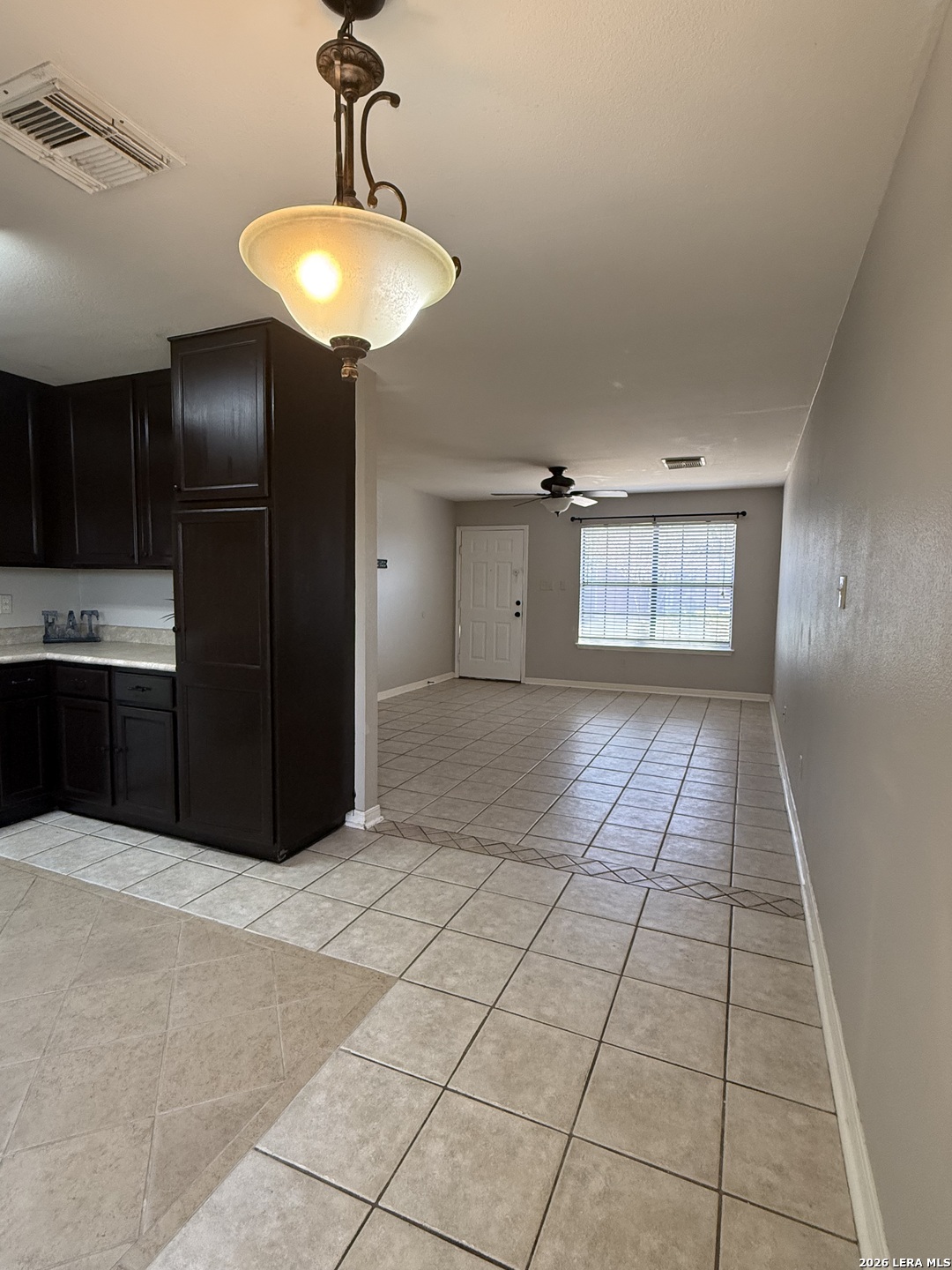 9140 Timber Path, Unit 802 San Antonio, TX 78250 - Photo 8 of 29 a living room with kitchen