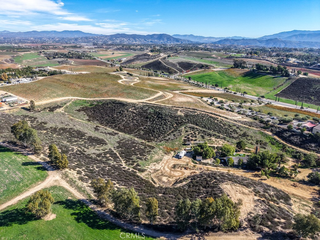 0 Reid Court Temecula, CA 92591 - Photo 24 of 31 a view of a lake with mountains in the background