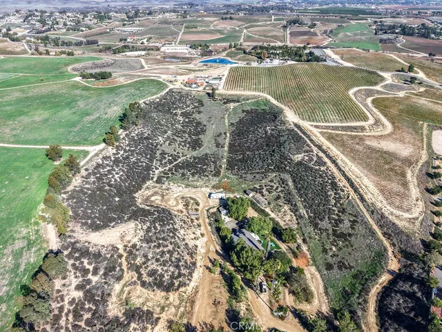 a view of a lake with a yard