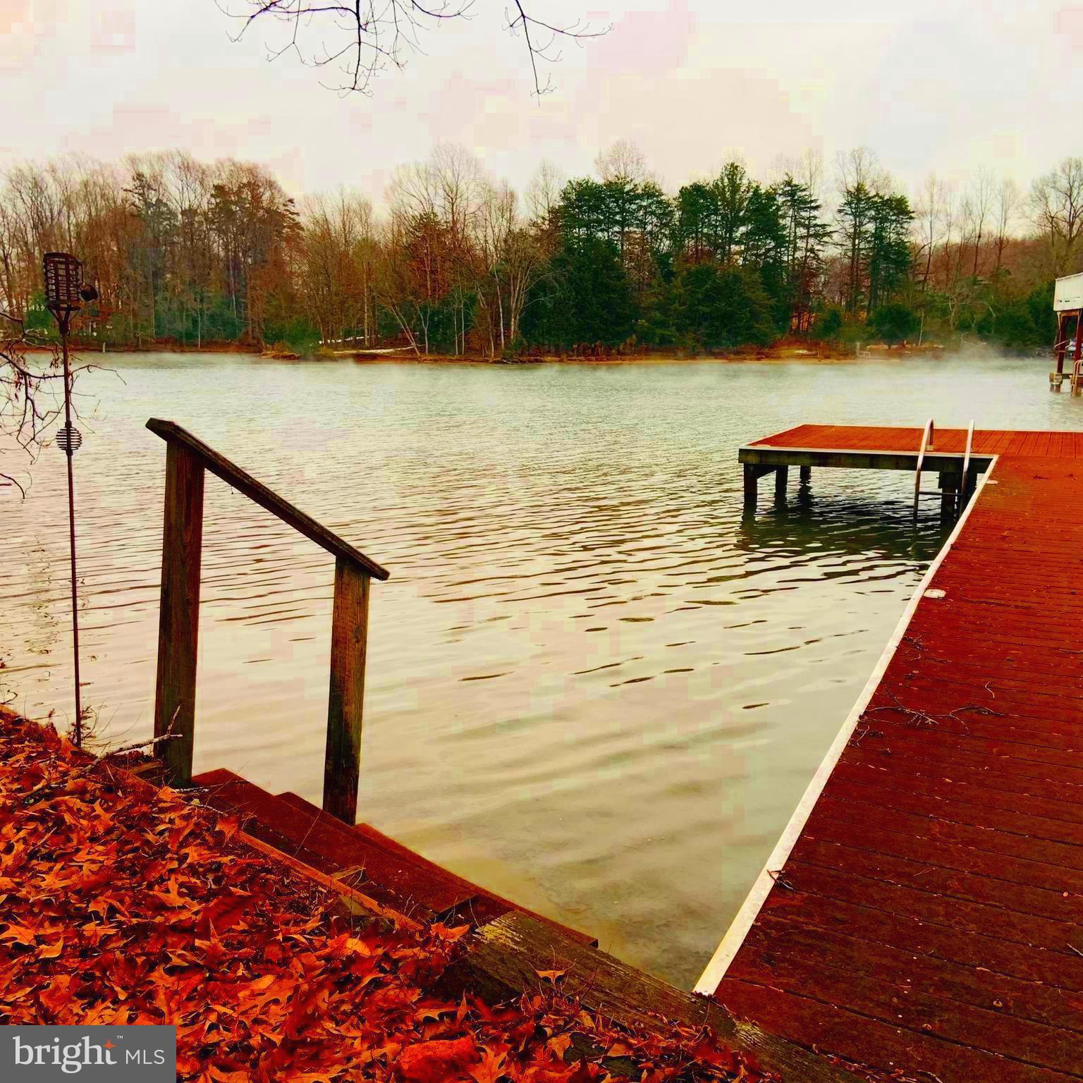 168 Barbara Road Mineral, VA 23117 - Photo 10 of 25 Steps down to water from shore and dock.