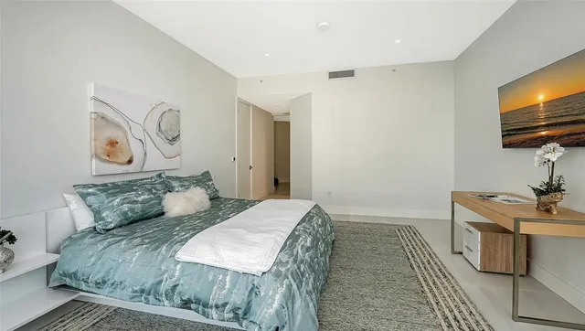 a white bath tub sitting next to a window