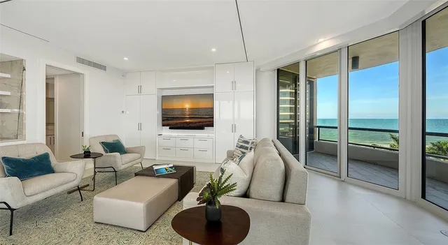 a view of a balcony with an ocean view